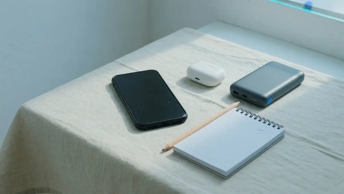 Mobile app desk with handset and notes