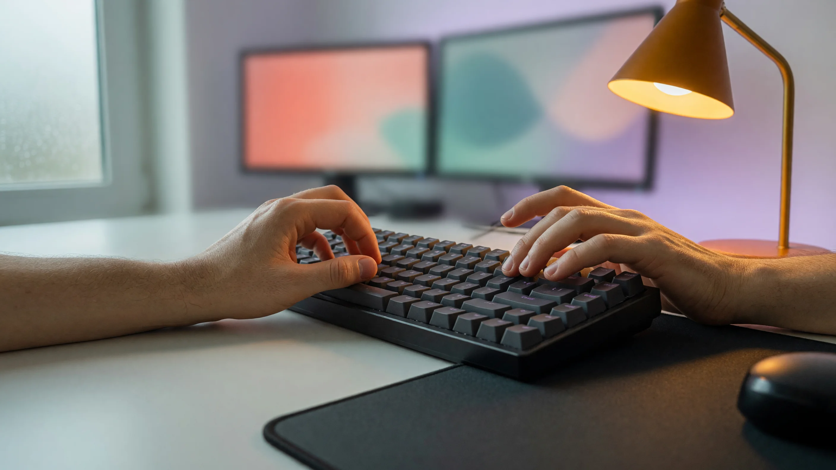 Player hands on a competition keyboard during training