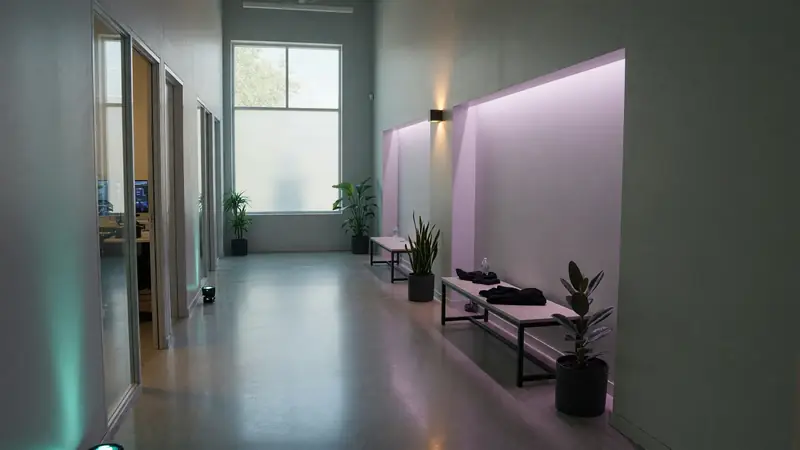 Team facility corridor with soft ice-blue light