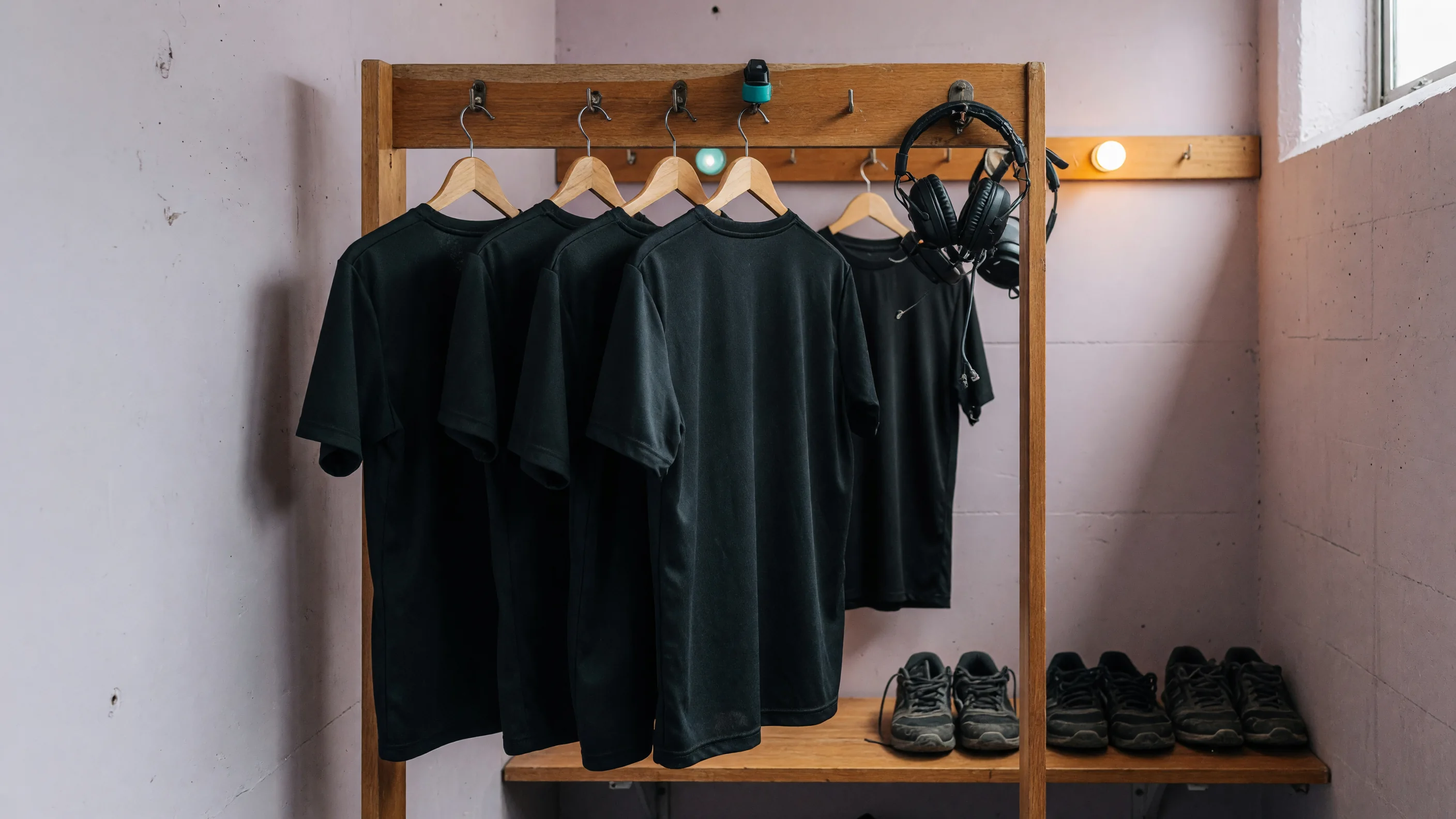 Anonymous team kit rack in a hallway